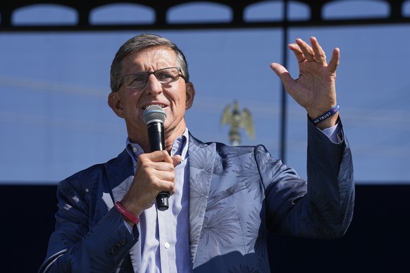 Former national security adviser Michael Flynn speaks during a &quot;rosary rally&quot; on Sunday, Aug. 6, 2023, in Norwood, Ohio. A national religious organization, Catholics for Catholics, gathered  ...