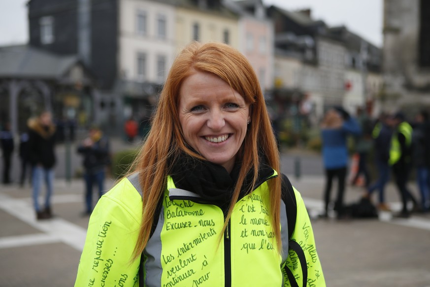 Ingrid Levavasseur, one of the leading figures of France&#039;s Yellow Vests protests, smiles as she waits for French President Emmanuel Macron&#039;s visit in Bourgtheroulde, Normandy, Tuesday, Jan.1 ...