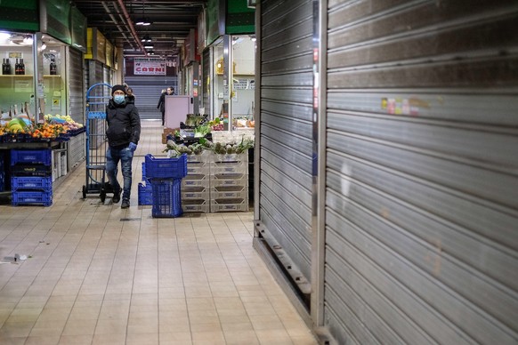 epa08288086 View of closed stalls at Mercato Trionfale, a traditional indoor market in Rome, during the coronavirus emergency lockdown in Rome, Italy, 12 March 2020. The World Health Organization (WHO ...