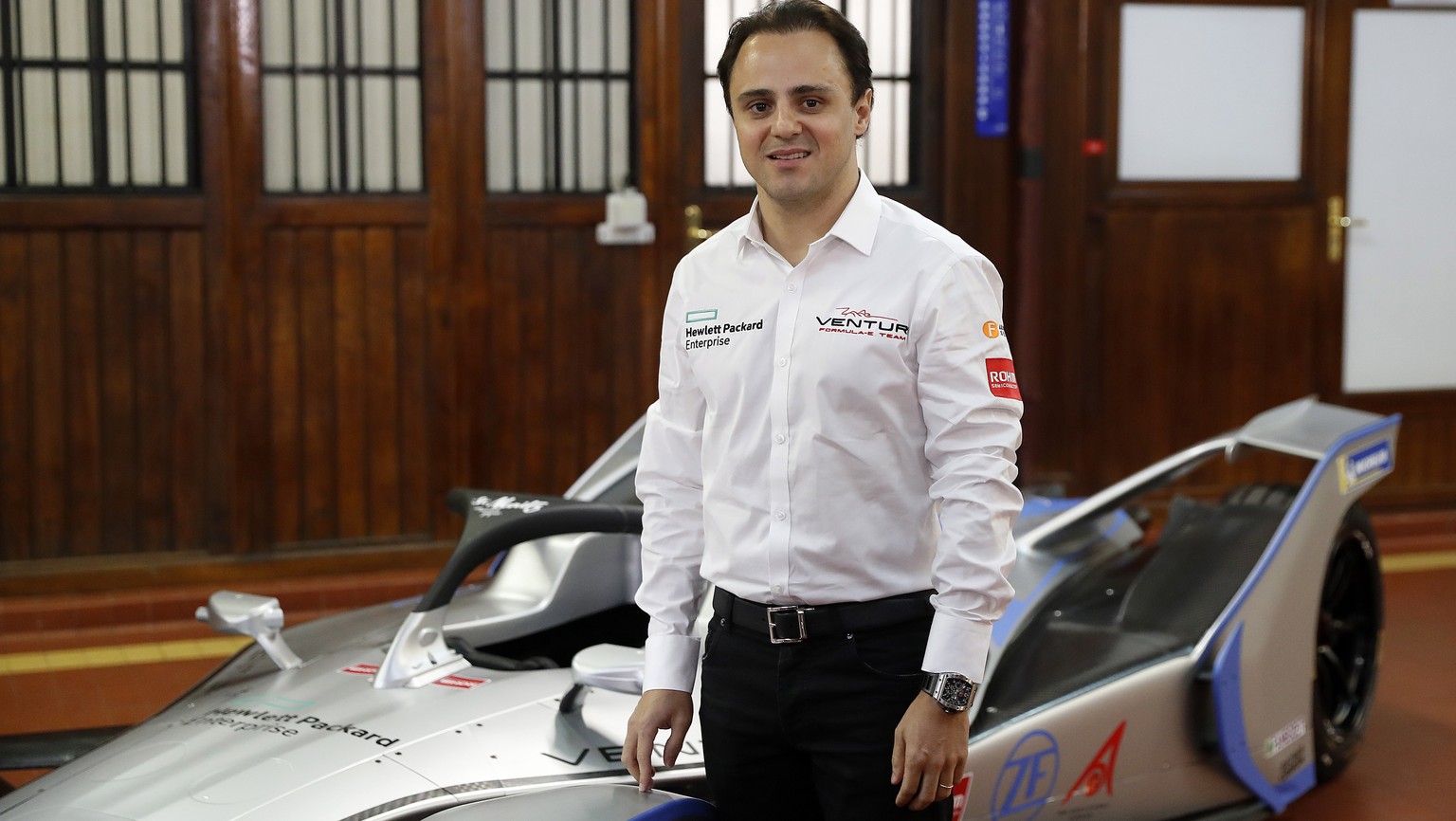 epa07199810 Brazilian Formula E driver Felipe Massa poses with the new Formula E Venturi car at Monaco Palace, in Monaco, 30 November 2018. EPA/SEBASTIEN NOGIER