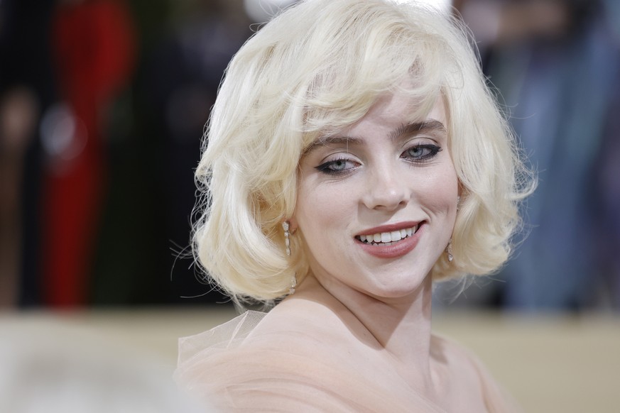 epa09466770 Billie Eilish poses on the red carpet for the 2021 Met Gala, the annual benefit for the Metropolitan Museum of Art's Costume Institute, in New York, New York, USA, 13 September 2021. ...