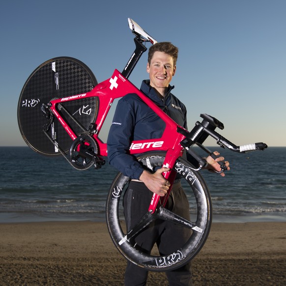 Swiss cyclist Stefan Kueng of the Groupama FDJ cycling team poses for the photographer with his against the clock bicycle during a training camp before the beginning of the season, in Calpe, Valencia, ...