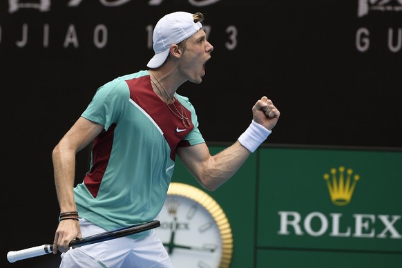 Denis Shapovalov of Canada reacts after winning a point against Laslo Djere of Serbia during their first round match at the Australian Open tennis championships in Melbourne, Australia, Monday, Jan. 1 ...