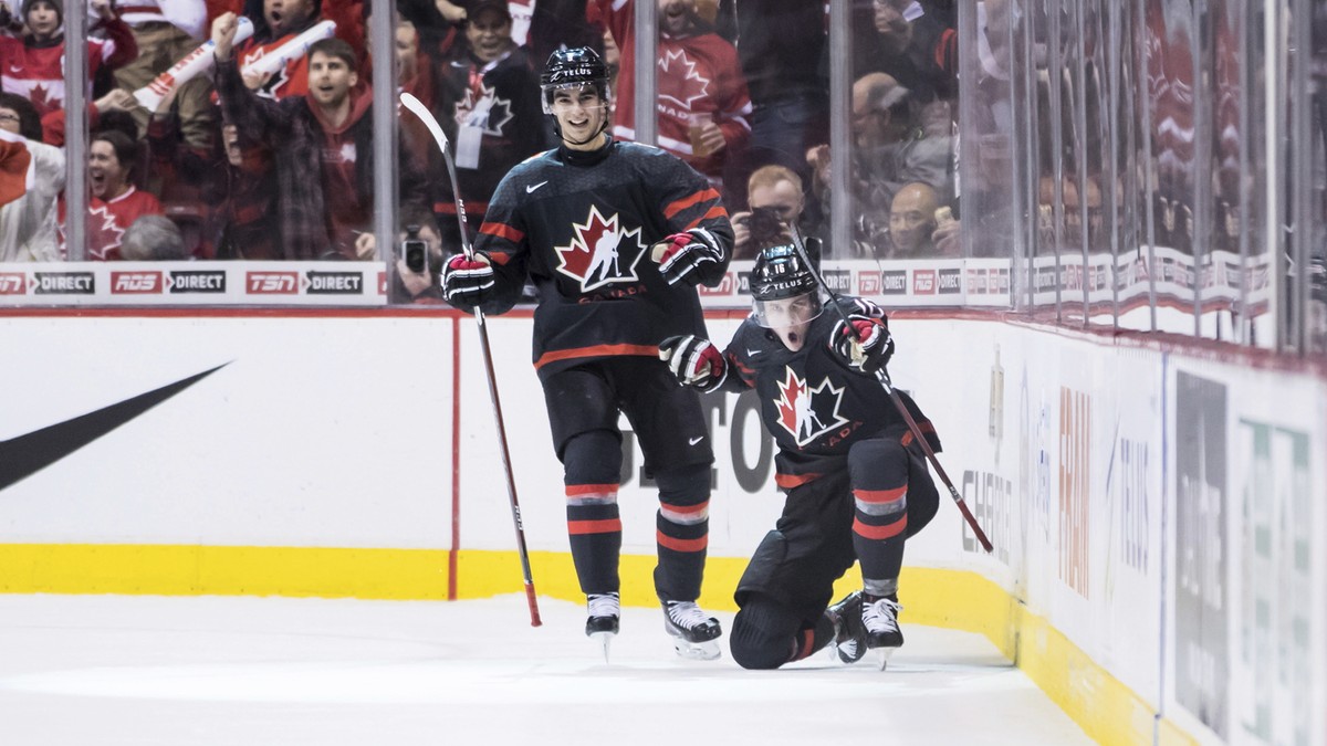 Canada's MacKenzie Entwistle, front right, and Joe Veleno celebrate Entwistle's goal against the Czech Republic during second-period IIHF world junior hockey championship game action in Vanc ...