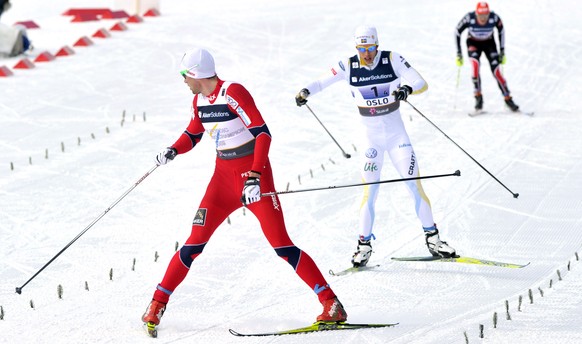 OSLO, NORWAY - MARCH 4: (FRANCE OUT) Petter jr. Northug of Norway takes 1st place, Daniel Rickardsson of Sweden takes 2nd place during the FIS Nordic World Ski Championships Cross-Country Men's 4x10km ...