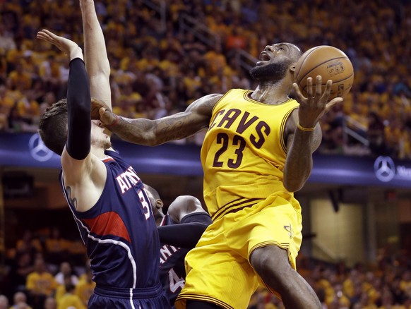 Cleveland Cavaliers&#039; LeBron James (23) goes up for a shot against Atlanta Hawks&#039; Mike Muscala during the second half in Game 3 of the Eastern Conference finals of the NBA basketball playoffs ...