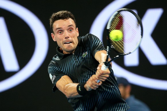 epa07282551 Roberto Bautista Agut of Spain in action against Andy Murray of Britain during their first round match at the Australian Open tennis tournament in Melbourne, Australia, 14 January 2019. EP ...