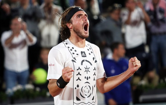 epa09978419 Stefanos Tsitsipas of Greece celebrates after winning the men&#039;s second round match against Zdenek Kolar of the Czech Republic during the French Open tennis tournament at Roland ?Garro ...