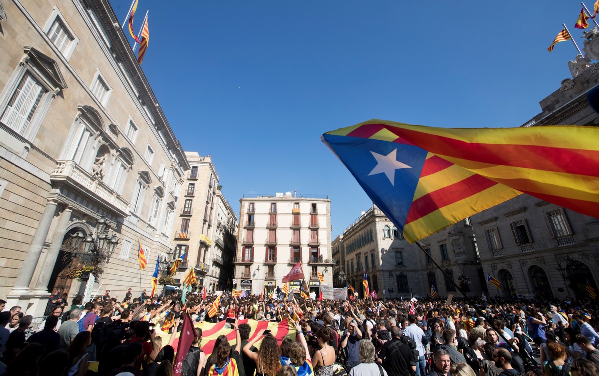 epa06290750 A Catalan pro-independence flag waves over hundreds of Catalan university and secondary students protesting against the application of the Spanish Constitution's Article 155 to the Ca ...