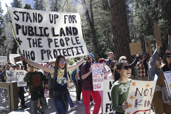 This photo provided by Jesus Sepulveda shows demonstrators as they march in protest of the Trump administration&#039;s recent firings of federal employees Saturday, March 1, 2025, in Yosemite National ...