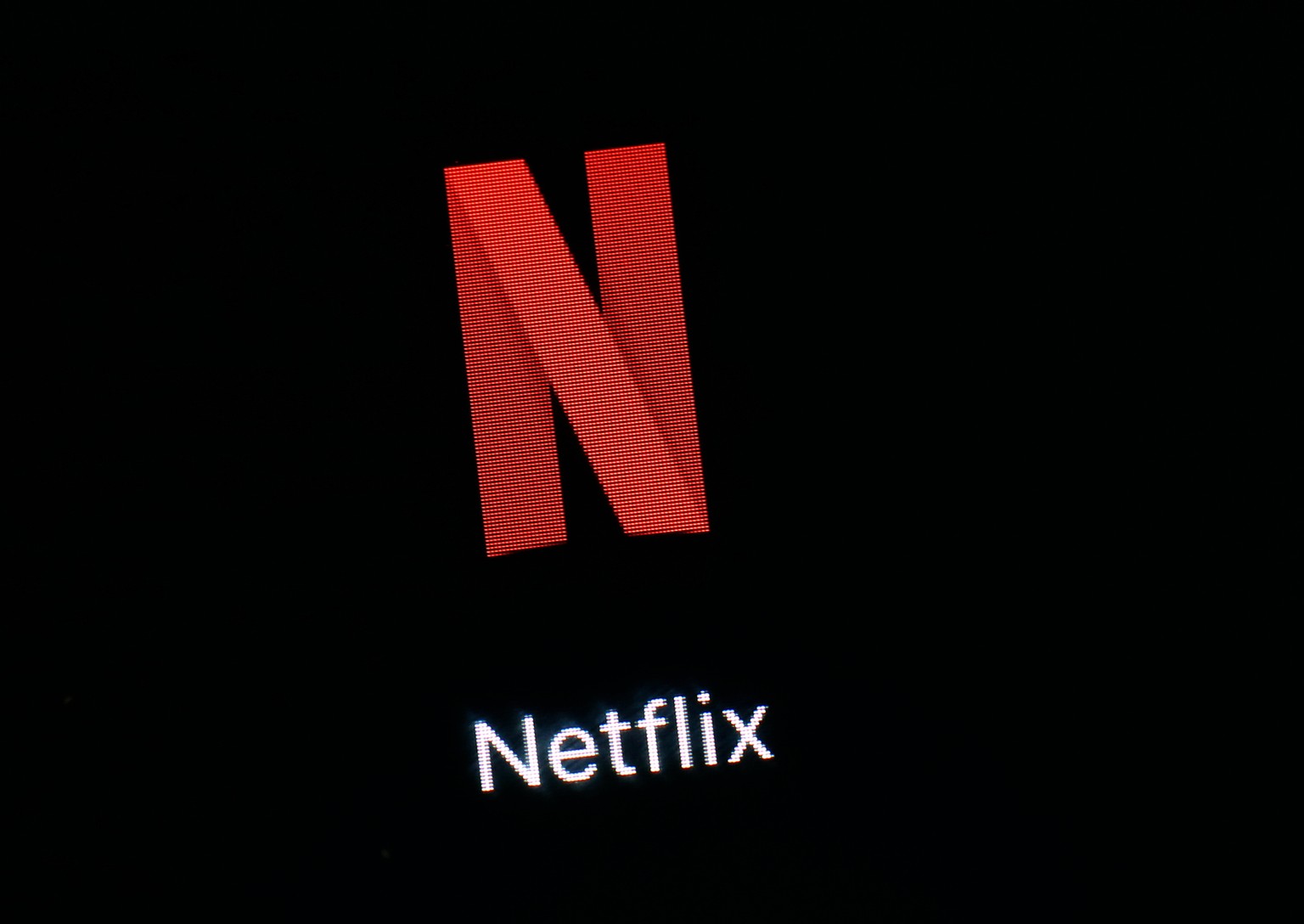 FILE- This March 19, 2018, file photo shows the Netflix app on an iPad in Baltimore. Netflix reports financial results Tuesday, April 16, 2019. (AP Photo/Patrick Semansky, File)