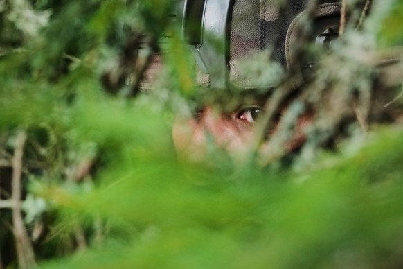 French service member sits in ambush during a multinational military Exercise Pikne (&quot;Lightning&quot;) near Valkla, Estonia, Saturday, Sept. 27, 2025. (AP Photo/Sergei Grits)
Estonia NATO Militar ...