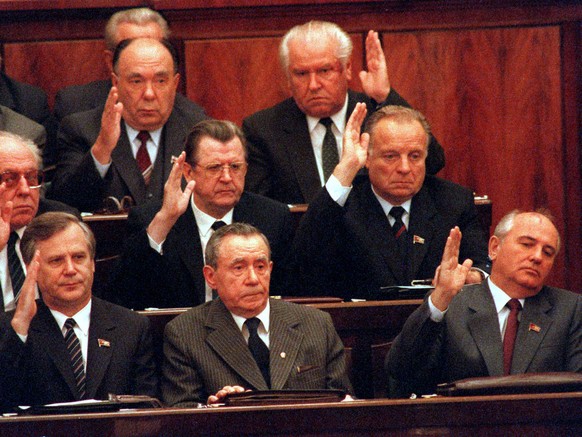 Members of the Politburo in Moscow vote to remove Andrei Gromyko, bottom center, as Soviet president on December 11, 1988. The Supreme Soviet named Communist Party chief Mikhail Gorbachev, bottom righ ...