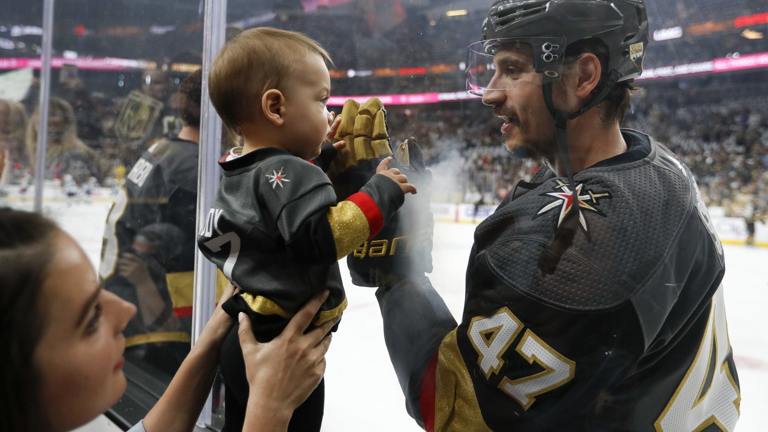 Vegas Golden Knights defenseman Luca Sbisa greets a young fan before Game 4 of the team&#039;s NHL hockey Western Conference finals against the Winnipeg Jets, Friday, May 18, 2018, in Las Vegas. (AP P ...