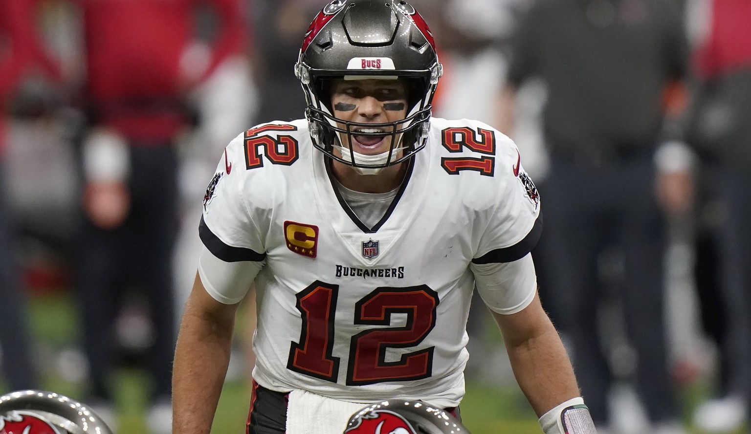 Tampa Bay Buccaneers quarterback Tom Brady (12) calls a play at the line of scrimmage against the New Orleans Saints during the second half of an NFL divisional round playoff football game, Sunday, Ja ...