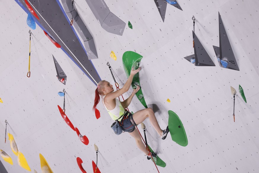 epa09382941 Janja Garnbret of Slovenia performs during a lead climbing training session for the Sport Climbing events of the Tokyo 2020 Olympic Games at the Aomi Urban Sports Park in Tokyo, Japan, 31 ...