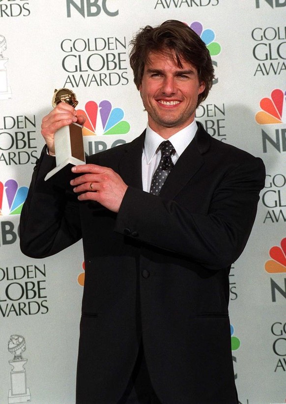 Tom Cruise mit seinem Golden Globe im Jahr 1997.
