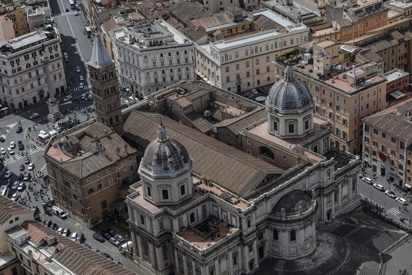 epa12054027 An aerial view of the Santa Maria Maggiore Basilica taken from an Italian Carabinieri helicopter patrolling above Rome, Italy, 25 April 2025. The funeral of Pope Francis, who died on 21 Ap ...
