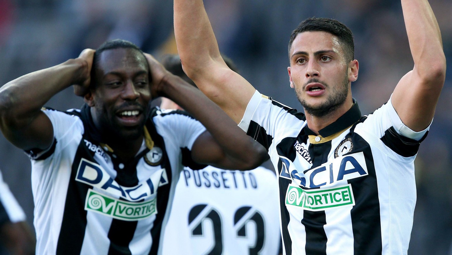 Udinese&#039;s Rolando Mandragora, right, celebrates with his teammate Stefano Okaka after scoring his side&#039;s 2nd goal during the Serie A soccer match between Udinese and Genoa at the Friuli stad ...