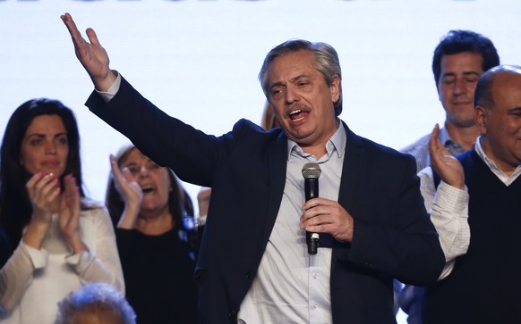 Presidential candidate Alberto Fernandez addresses supporters at the &quot;Frente de Todos&quot; party headquarters after primary elections in Buenos Aires, Argentina, Sunday, Aug. 11, 2019. The &quot ...