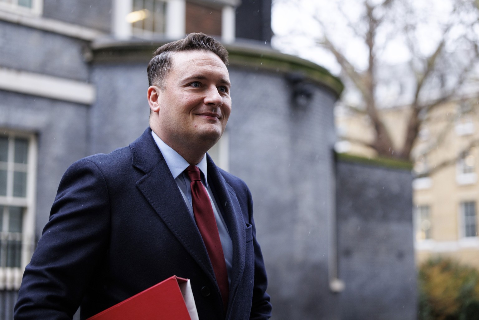 epa12646508 Britain's Secretary of State for Health and Social Care Wes Streeting leaves after a cabinet meeting of the UK government at 10 Downing Street in London, Britain, 13 January 2026. EPA ...