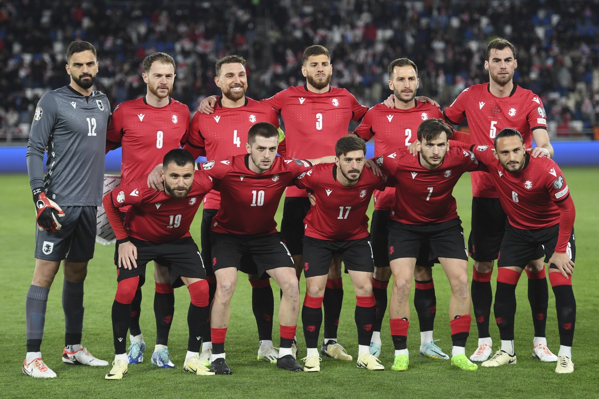 Georgia's players pose prior to the Euro 2024 qualifying play-off soccer match between Georgia and Greece at the Boris Paichadze National Stadium in Tbilisi, Georgia, Tuesday, March 26, 2024. (AP ...