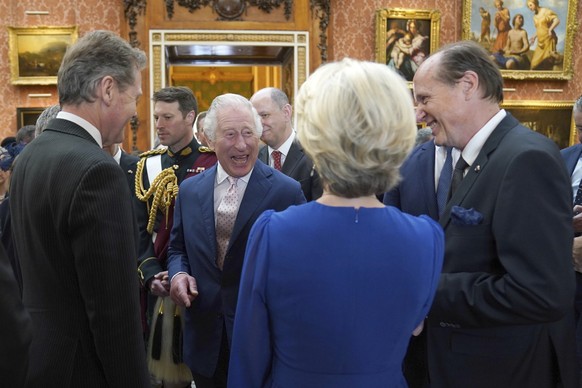 King Charles III, center, shares a joke with the President of the European Commission Ursula von der Leyen, during a reception at Buckingham Palace, in London, Friday May 5, 2023 for overseas guests a ...