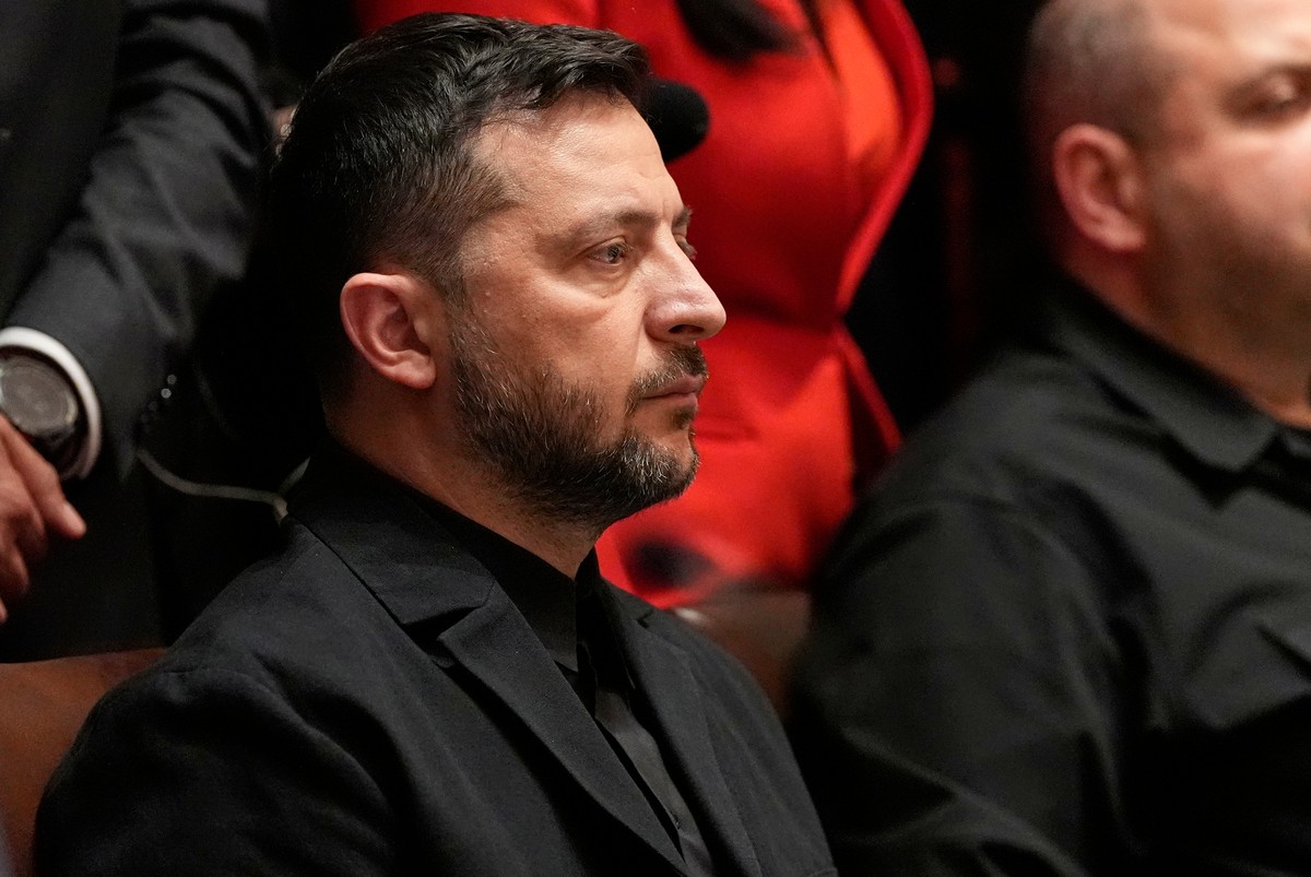 Ukraine's President Volodymyr Zelenskyy listens as President Donald Trump speaks before a lunch in the Cabinet Room of the White House, Friday, Oct. 17, 2025, in Washington. (AP Photo/Alex Brando ...