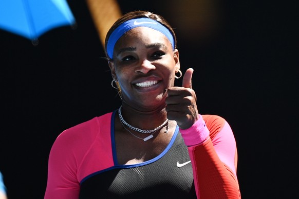 epa09011122 Serena Williams of the USA celebrates after winning her fourth Round Women&#039;s singles match against Aryna Sabalenka of Belarus on Day 7 of the Australian Open at Melbourne Park in Melb ...