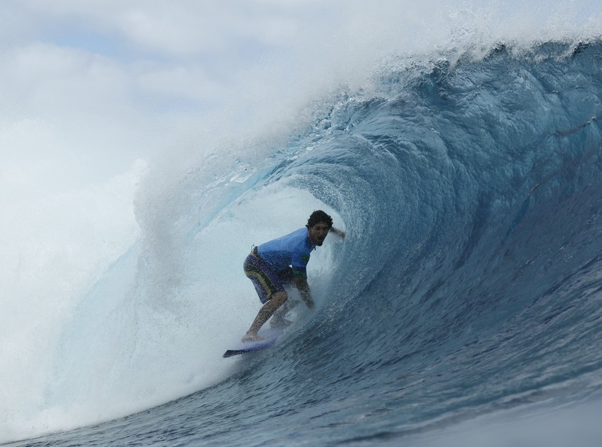 Gabriel Medina, of Brazil, gets a barrel in the bronze medal final of the surfing competition at the 2024 Summer Olympics, Monday, Aug. 5, 2024, in Teahupo&#039;o, Tahiti. (Ben Thouard/Pool Photo via  ...