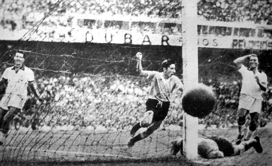 FILE - Uruguay player Ghiggia scores during the World Cup final soccer match against Brazil, in the Maracana Stadium in Rio de Janeiro, Brazil on July 16, 1950. Uruguay won 2-1. (AP Photo/File)