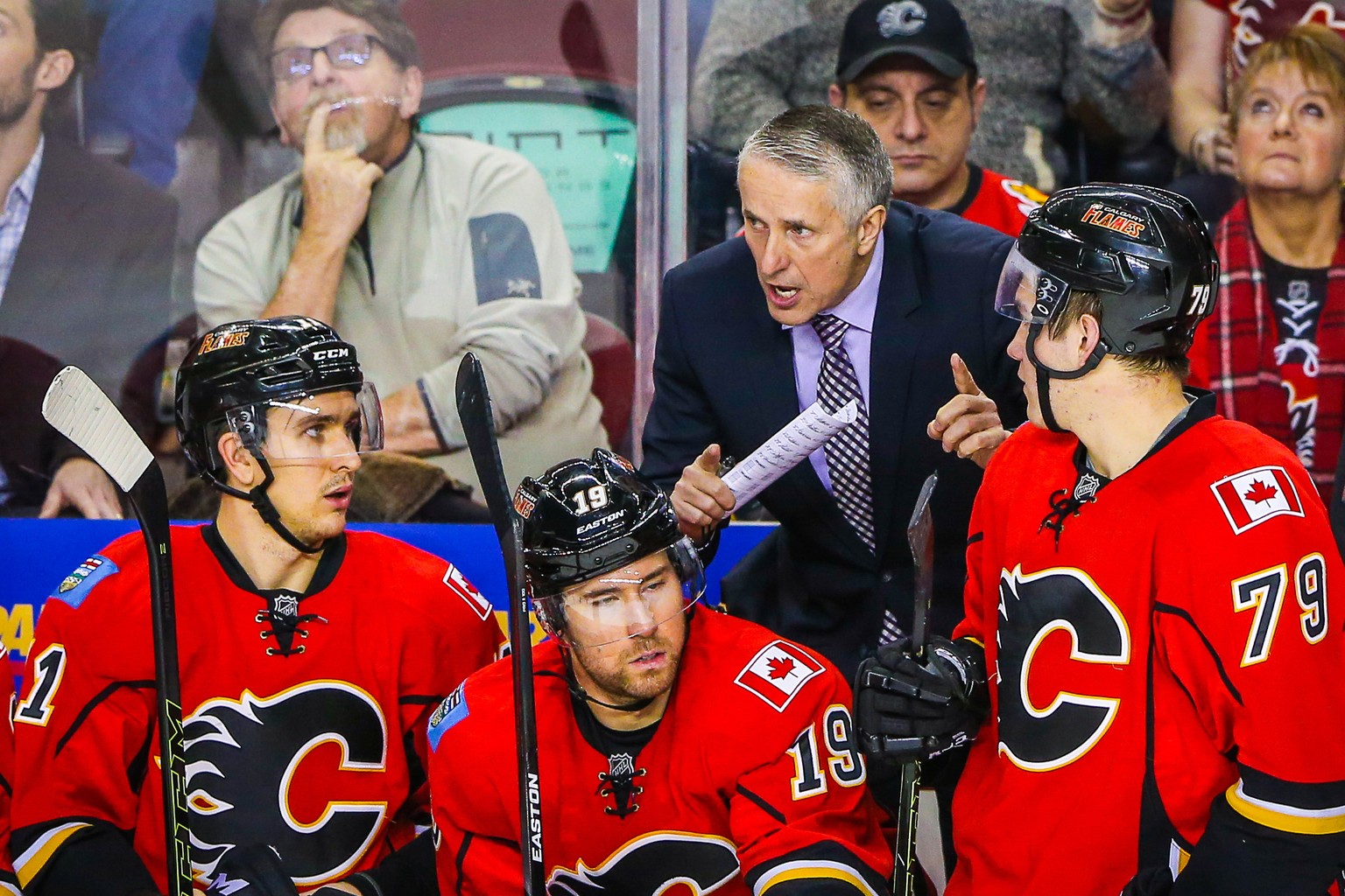 Jan 5, 2016; Calgary, Alberta, CAN; Calgary Flames head coach Bob Hartley on his bench against the Tampa Bay Lightning during the third period at Scotiabank Saddledome. Calgary Flames won 3-1. Mandato ...