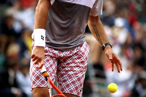 JAHRESRUECKBLICK 2015 - PEOPLE - Stan Wawrinka of Switzerland in action against Gilles Simon of France during their fourth round match for the French Open tennis tournament at Roland Garros in Paris,  ...