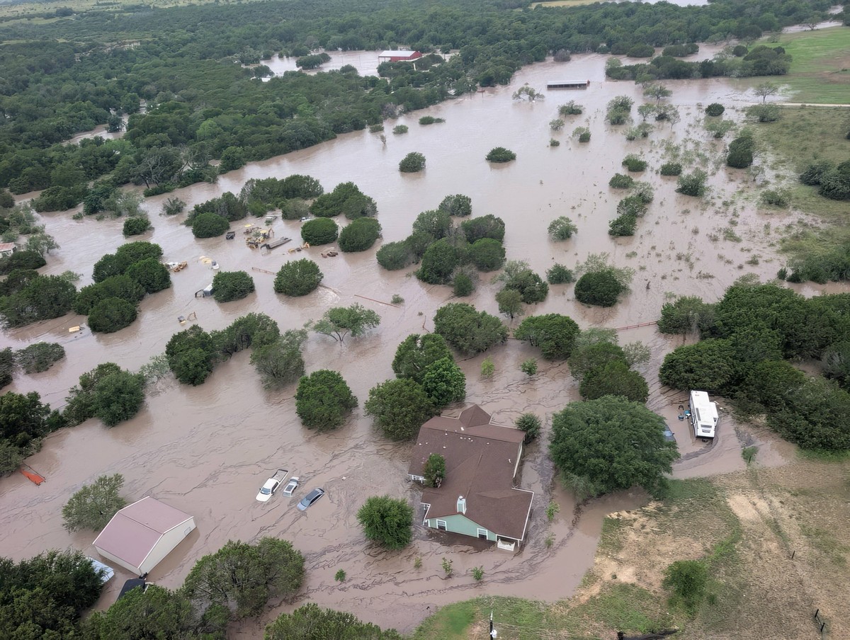 July 5, 2025, Kerville, Texas, Tx, United States of America: Aerial view from a Coast Guard Search and Rescue helicopter of the Guadalupe River flooding the surrounding area, July 5, 2025 near Kervill ...