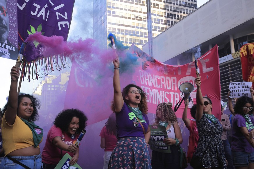 Abortion rights activists march against an anti-abortion congressional bill, along Paulista Avenue in Sao Paulo, Saturday, June 15, 2024. (AP Photo/Ettore Chiereguini)