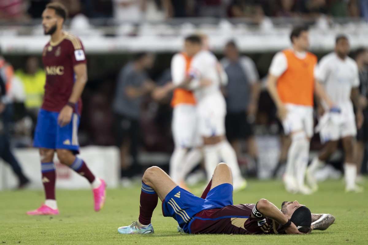 Servette's defender Steve Rouiller looks disappointed after losing the UEFA Champions League Third qualifying round second leg soccer match between Switzerland's Servette FC and Scotland ...