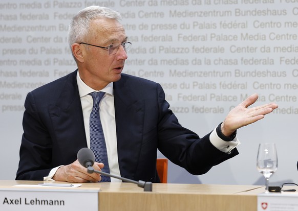 Axel Lehmann, Chairman Credit Suisse, left, speaks beside Colm Kelleher, Chairman UBS, during a press conference, on Sunday, 19 March 2023 in Bern. The bank UBS takes over Credit Suisse for 2 billion  ...