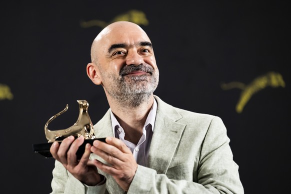 epa13171510 Romanian film director Florin Serban poses with his 'Pardo d'Oro - Grand Prize of the Festival and City of Locarno' Golden Leopard award of the 'Concorso Internazionale ...