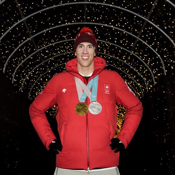 Ramon Zenhaeusern of Switzerland poses with the Gold and Silver medals at the House of Switzerland after the Alpine Skiing Team event during the XXIII Winter Olympics 2018 in Pyeongchang, South Korea, ...