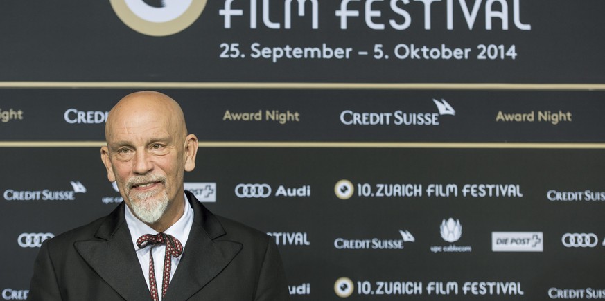 epaselect epa04431959 US actor, director and producer John Malkovich poses for media on the green carpet during the 10th Zurich Film Festival in Zurich, Switzerland, 04 October 2014. Malkovich will re ...