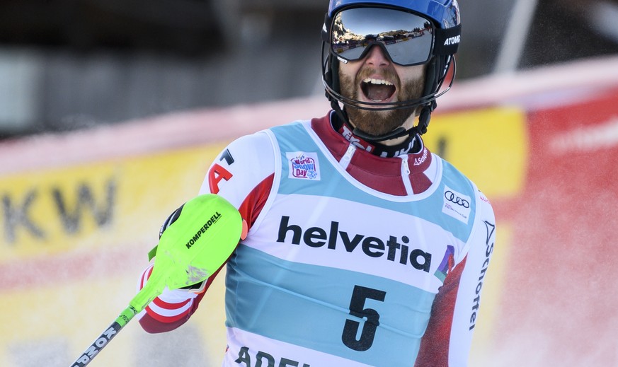 Marco Schwarz of Austria reacts in the finish area of the second run of the men's slalom race at the Alpine Skiing FIS Ski World Cup in Adelboden, Switzerland, Sunday, January 10, 2021. (KEYSTONE/Pete ...