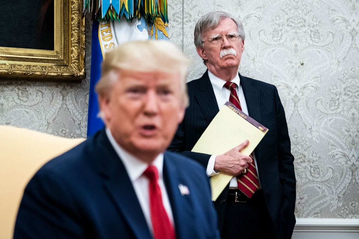 WASHINGTON, DC - JULY 18 : National Security Advisor John R. Bolton listens as President Donald J. Trump meets with Prime Minister of the Netherlands Mark Rutte in the Oval Office at the White House o ...