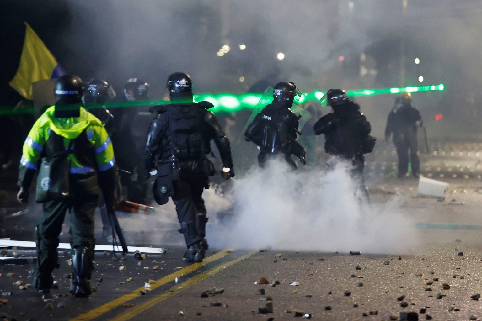 epa09173016 Members of the Mobile Anti-Riot Squad (ESMAD) confront protesters who arrive in the neighborhood where the President of Colombia Ivan Duque has his residence, during a day of protests agai ...