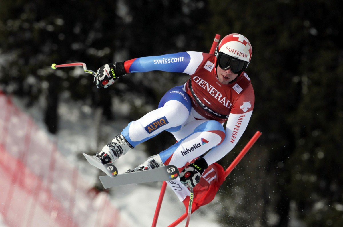 Switzerland's Beat Feuz speeds down to the course on his way to winning an alpine ski, World Cup men's downhill race, in Kvitfjell, Norway, Friday, March 11, 2011. (AP Photo/Alessandro Trova ...