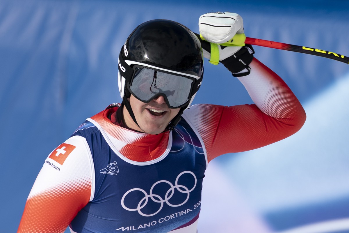epa12711898 Switzerland's Franjo von Allmen celebrates in the finish area during the men's Alpine Skiing Downhill race at the 2026 Olympic Winter Games at the Stelvio Ski Center in Bormio, I ...