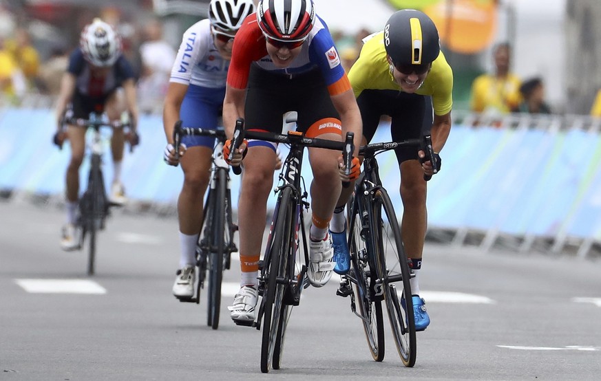 2016 Rio Olympics - Cycling Road - Final - Women&#039;s Road Race - Fort Copacabana - Rio de Janeiro, Brazil - 07/08/2016. Anna van der Breggen (NED) of Netherlands in the final sprint with Emma Johan ...