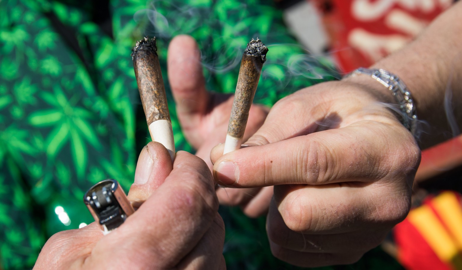 epa05946993 People take part in the Global Cannabis March in Copenhagen, Denmark 06 May 2017. The march in Copenhagen began in Freetown Christiania and between 2.000 and 3.000 people participated in t ...