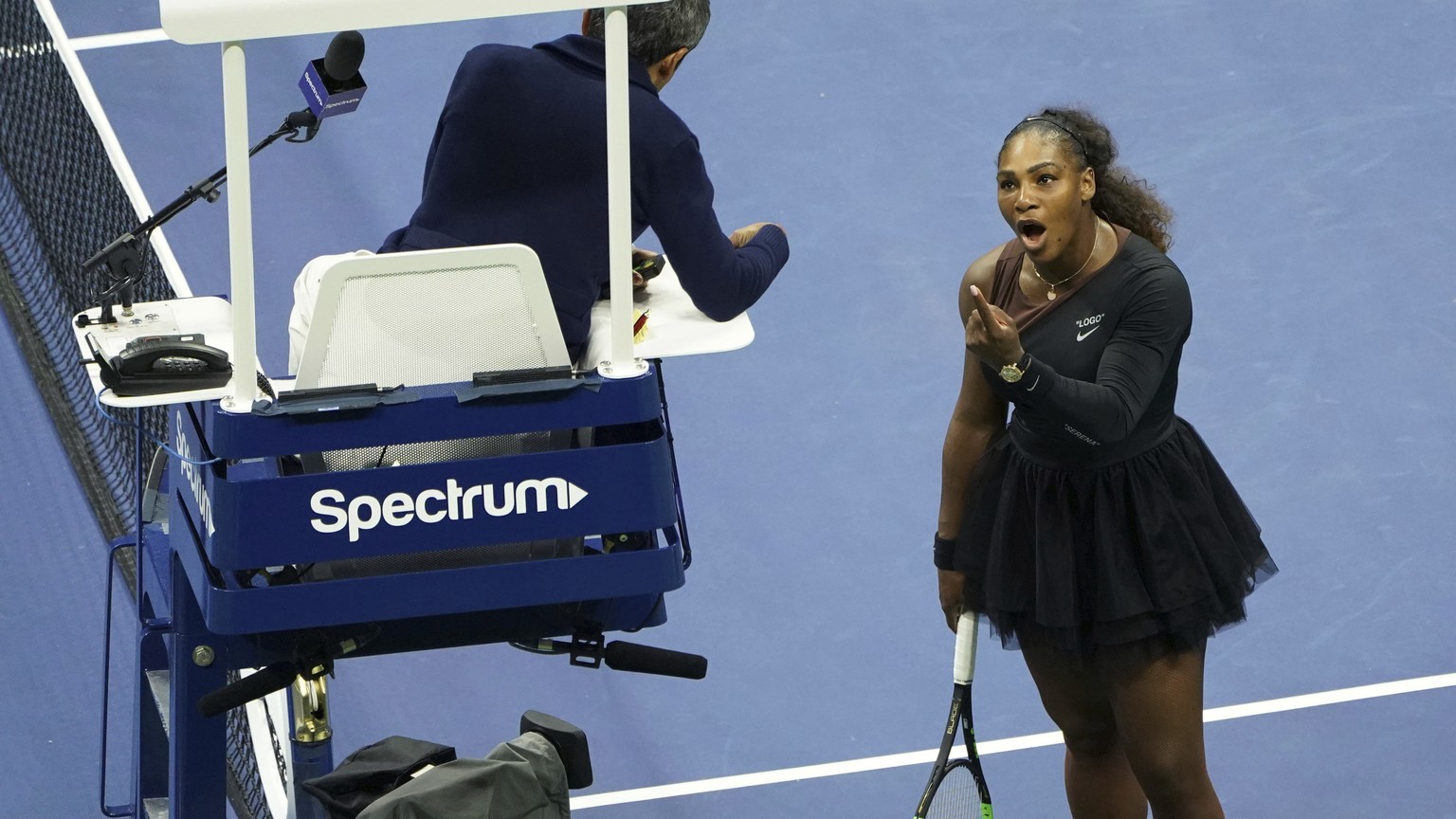 Serena Williams argues with the chair umpire during a match against Naomi Osaka, of Japan, during the women&#039;s finals of the U.S. Open tennis tournament at the USTA Billie Jean King National Tenni ...