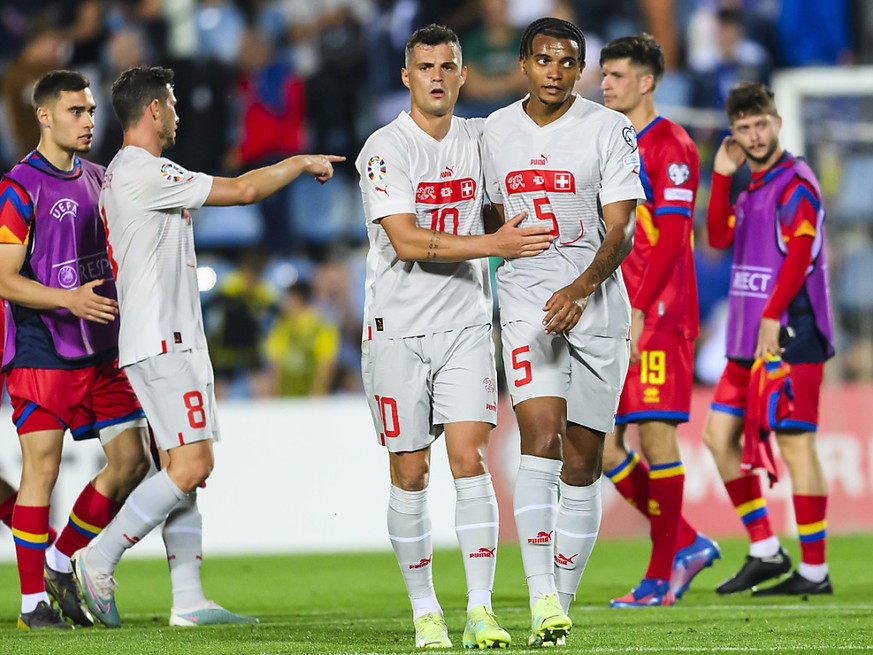 Le soulagement de Granit Xhala et de Manuel Akanji au coup de sifflet final.