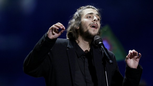 epa05962503 Salvador Sobral from Portugal performs during the Grand Final of the 62nd annual Eurovision Song Contest (ESC) at the International Exhibition Centre in Kiev, Ukraine, 13 May 2017. EPA/SER ...